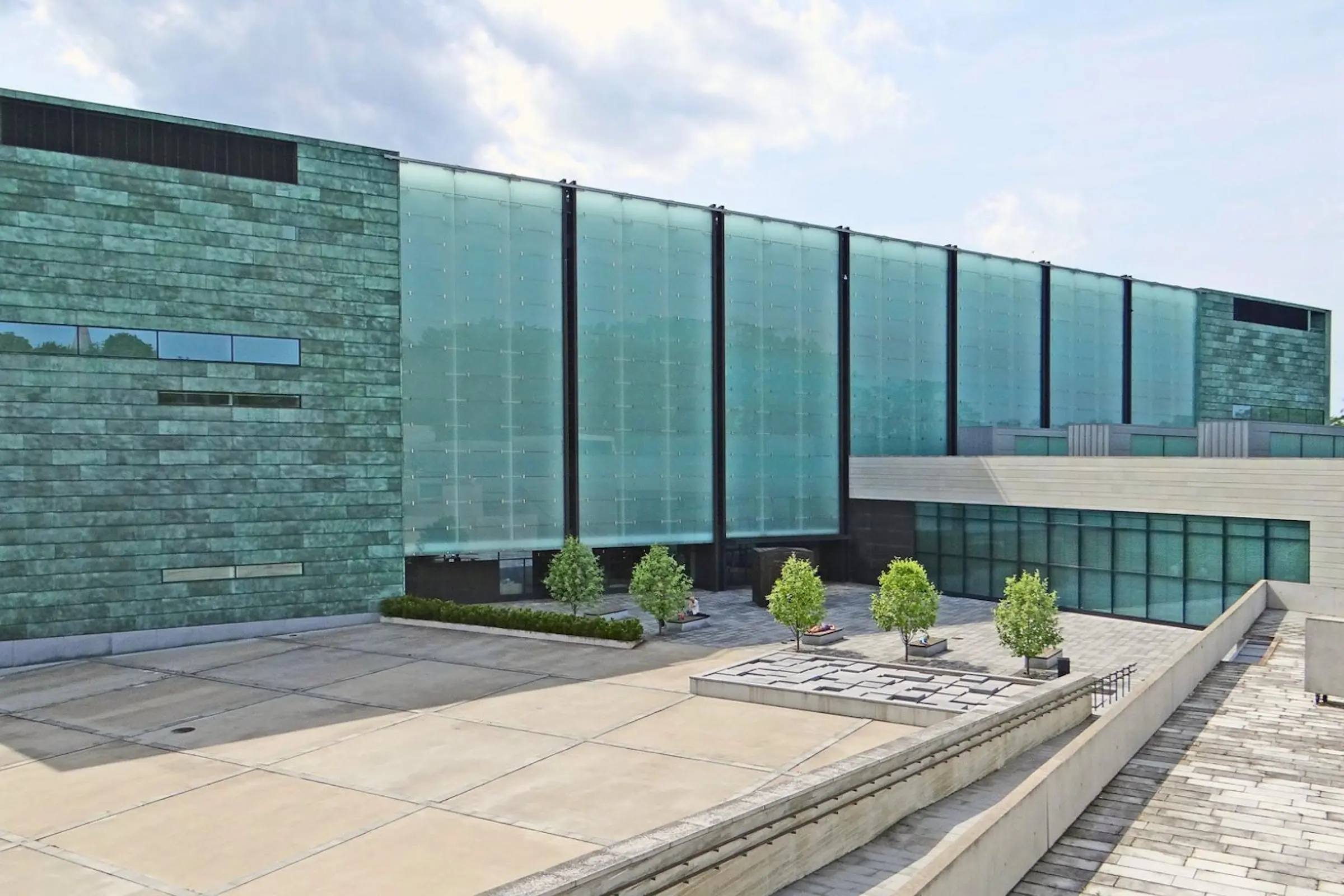 The curved limestone exterior of the Kumu Art Museum in Tallinn