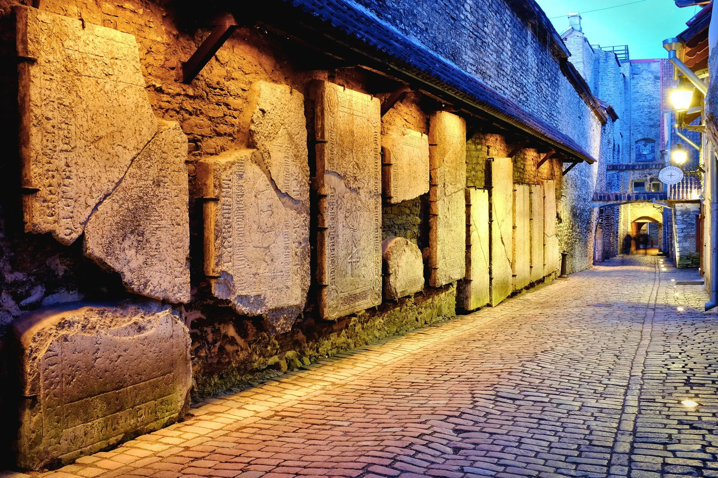 Medieval tombstones mounted on the wall in St. Catherine's Passage